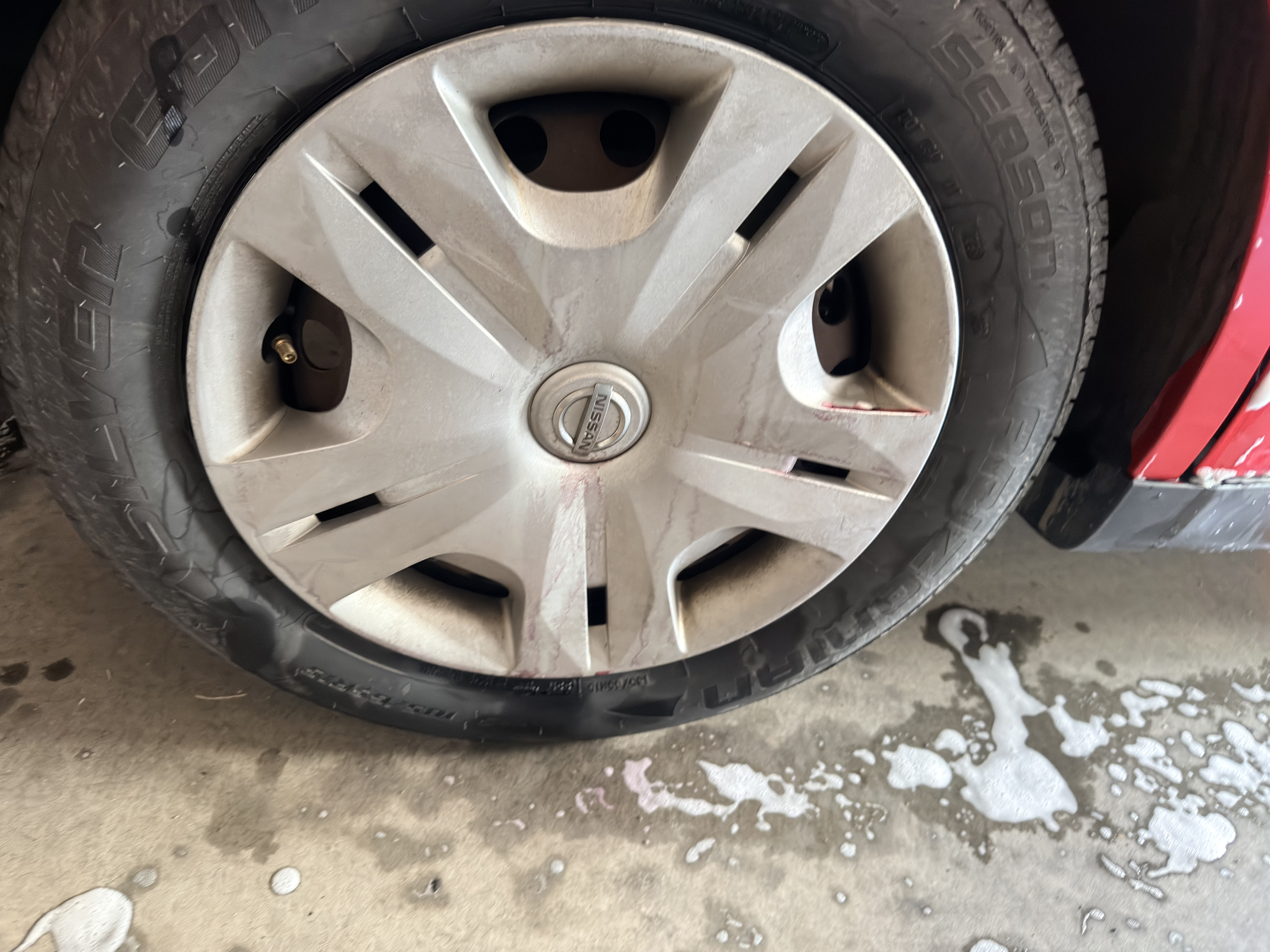 Nissan Versa wheel with heavy brake dust